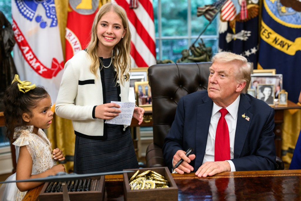 President Donald Trump, joined by HHS Secretary Robert F. Kennedy, Jr. and children affected by cancer and their families, signs an Executive Order to accelerate pediatric cancer research, Tuesday, September 30, 2025, in the Oval Office. (Official White House Photo by Molly Riley)
