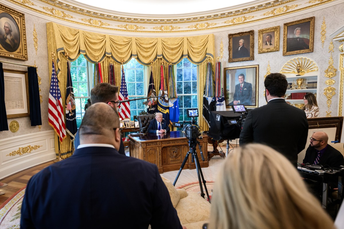 President Donald Trump films a video giving updates on the U.S. peace plan for Gaza in the Oval Office, Friday, October 3, 2025. (Official White House Photo by Molly Riley)