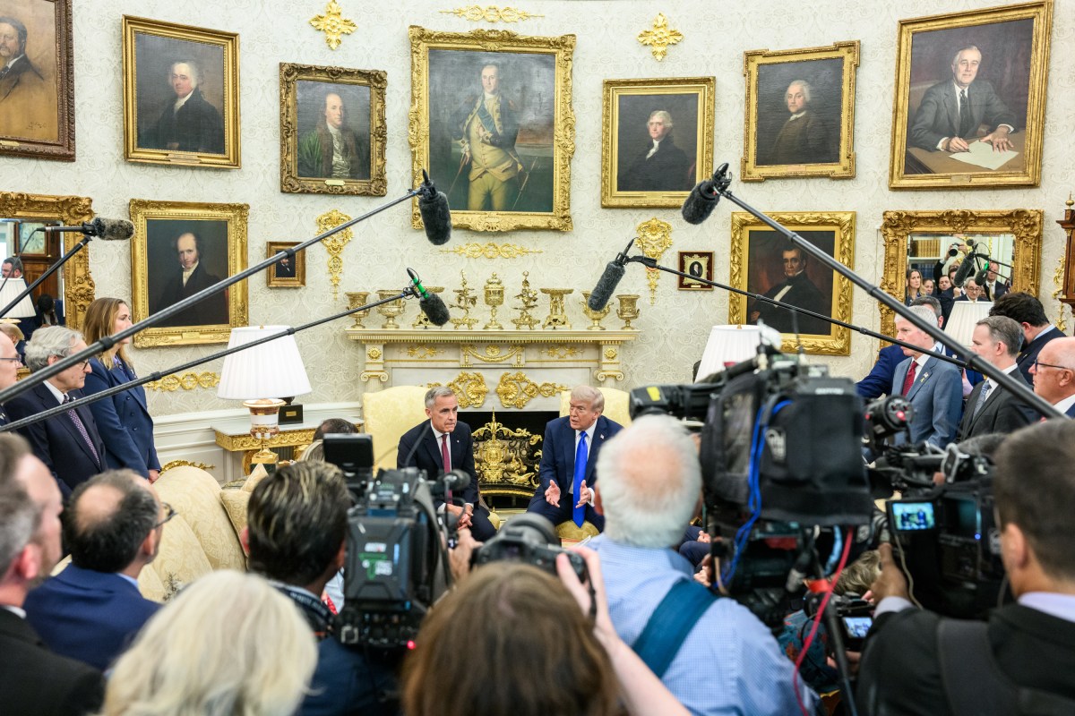 President Donald Trump and Canadian Prime Minister Mark Carney field questions from members of the media before their meeting, Tuesday, October 7, 2025, in the Oval Office. (Official White House Photo by Daniel Torok)