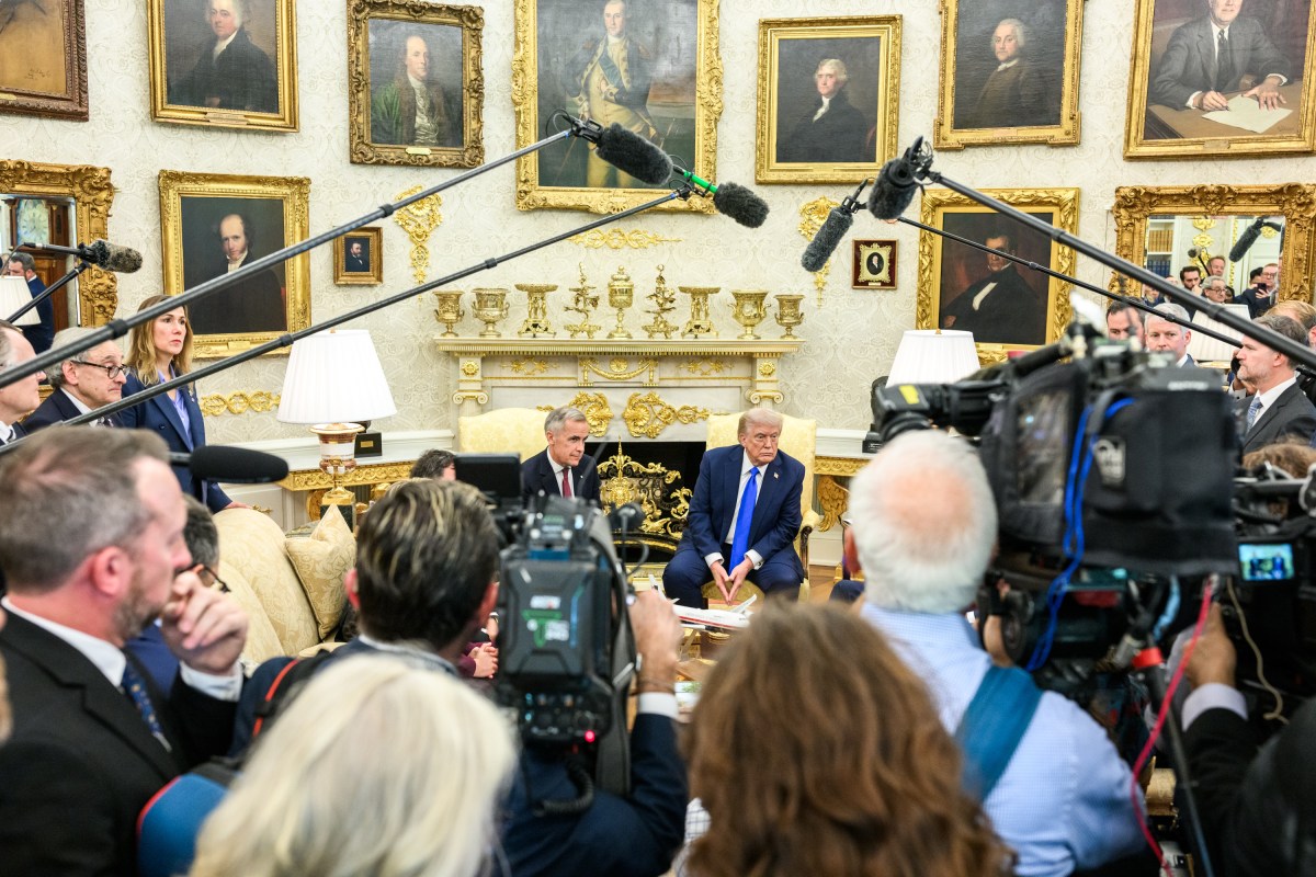 President Donald Trump and Canadian Prime Minister Mark Carney field questions from members of the media before their meeting, Tuesday, October 7, 2025, in the Oval Office. (Official White House Photo by Daniel Torok)