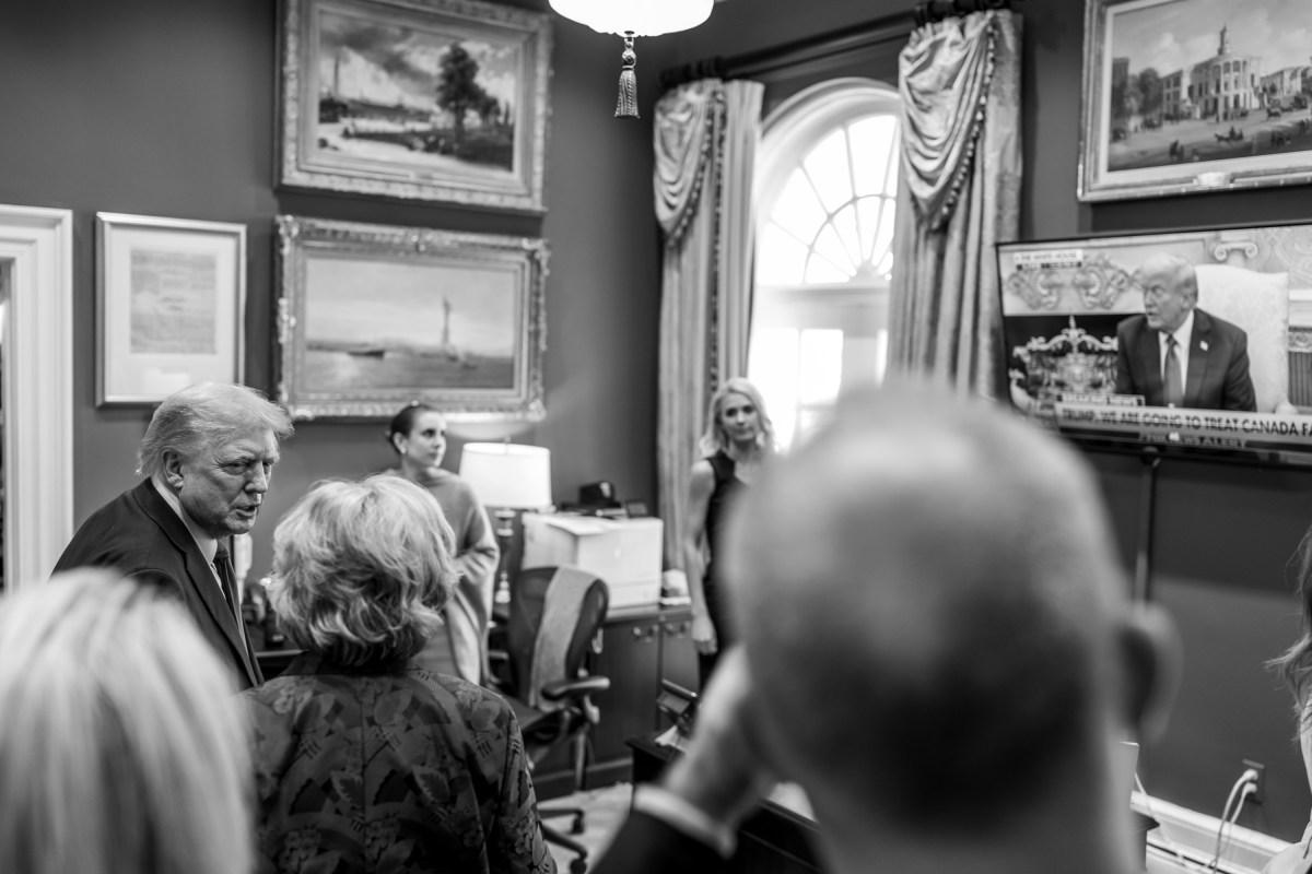 President Donald Trump watches the news in the Outer Oval Office after his meeting with Canadian Prime Minister Mark Carney, Tuesday, October 7, 2025. (Official White House Photo by Daniel Torok)