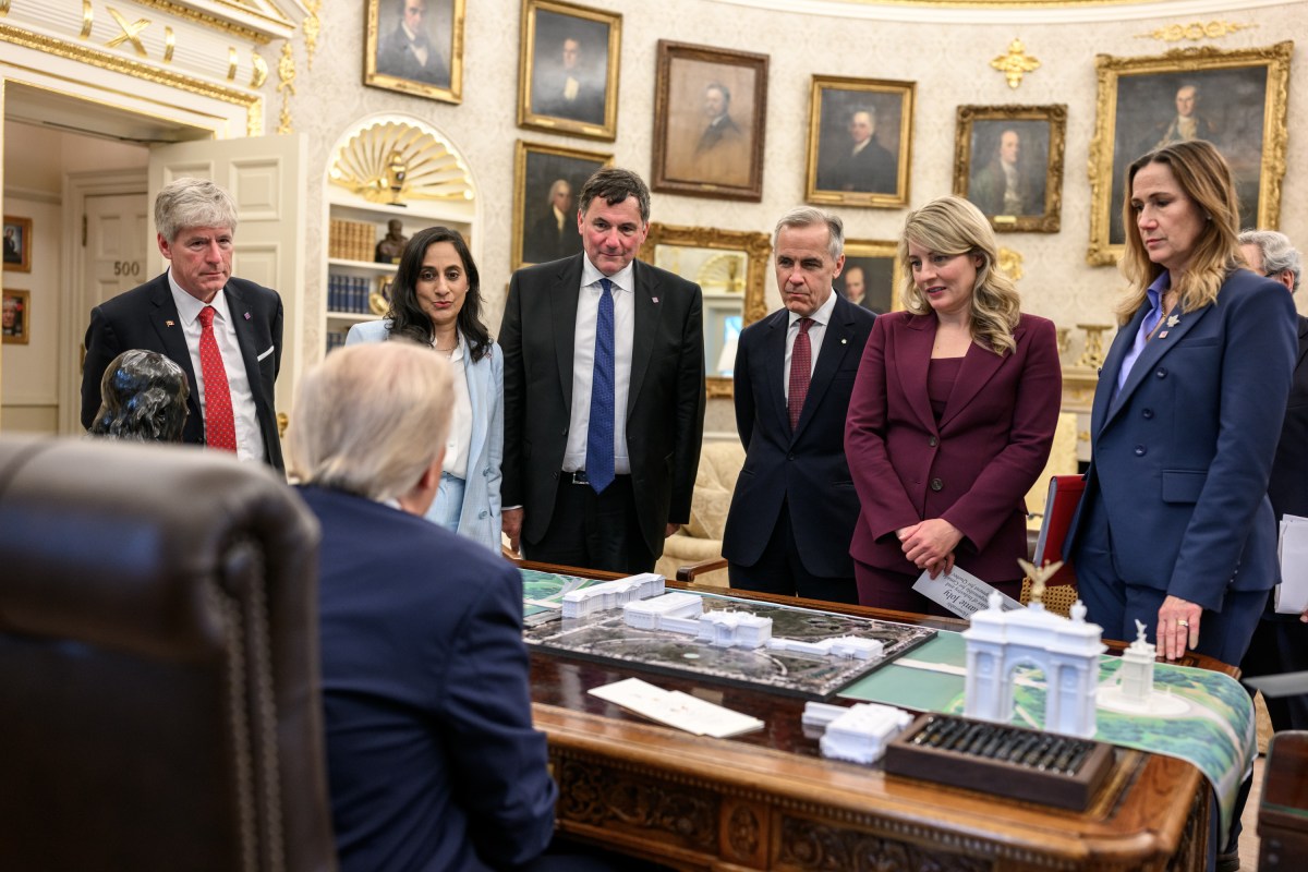 President Donald Trump speaks with Canadian Prime Minister Mark Carney and members of the Canadian delegation in the Oval Office, Tuesday, October 7, 2025. (Official White House Photo by Daniel Torok)