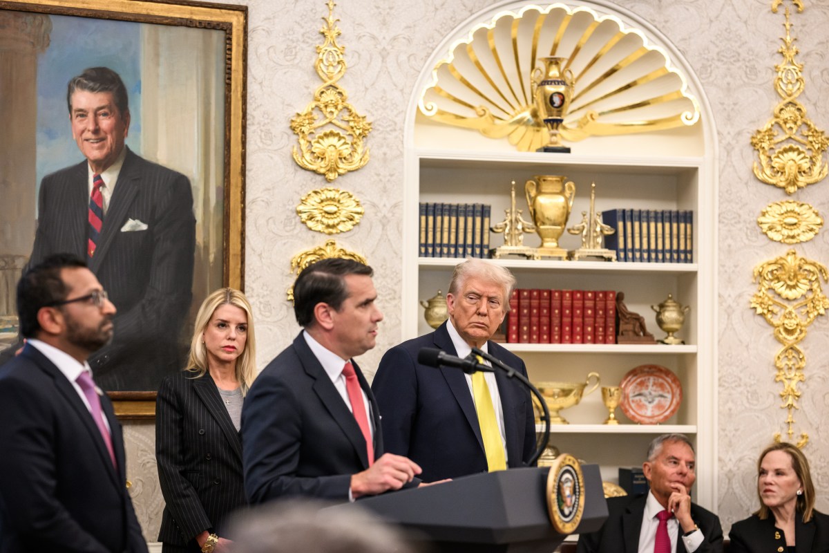 President Donald Trump participates in a press conference with FBI Director Kash Patel, Attorney General Pam Bondi, and Deputy Attorney General Todd Blanche, Wednesday, October 15, 2025, in the Oval Office. (Official White House Photo by Molly Riley)