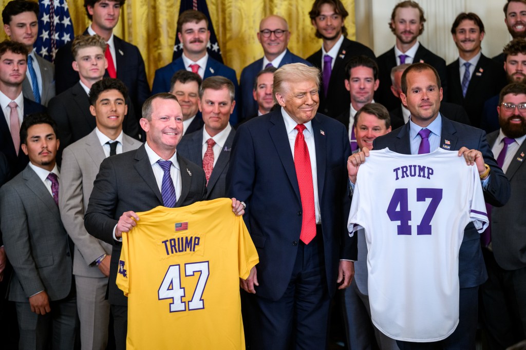 Louisiana State University Tigers head coach Jay Johnson and LSU Shreveport Pilots head coach Brad Neffendorf present commemorative jerseys to President Donald Trump at a 2025 College World Series Championship celebration, Monday, October 20, 2025, in the East Room. (Official White House Photo by Molly Riley)