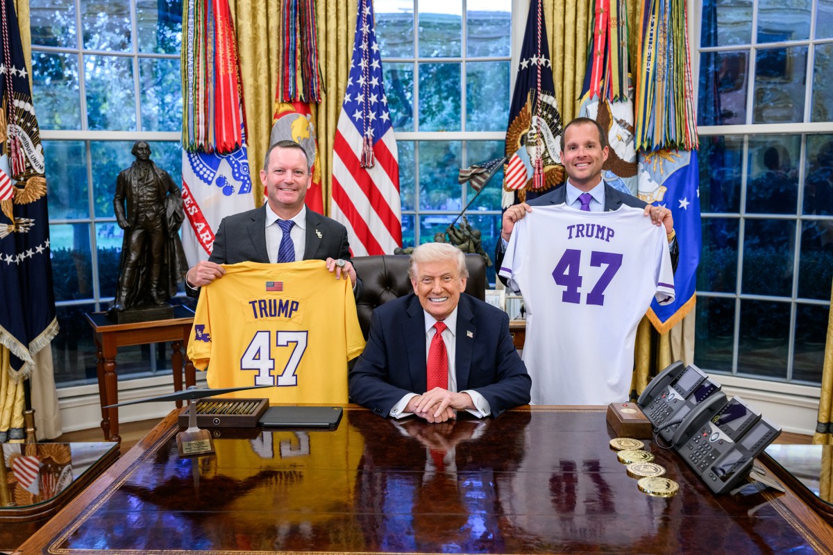 President Donald Trump poses for photos with Louisiana State University Tigers head coach Jay Johnson and LSU Shreveport Pilots head coach Brad Neffendorf in the Oval Office, Monday, October 20, 2025. (Official White House Photo by Molly Riley)