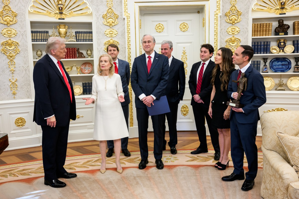 President Donald Trump is presented with the Richard Nixon Architect of Peace Award, Tuesday, October 21, 2025, during a ceremony in the Oval Office. In attendance are Richard Nixon’s daughter, Tricia Nixon Cox, her husband Edward Cox,  ex-national security adviser Robert O’Brien, and acting archivist of the U.S. Jim Byron. (Official White House Photo by Daniel Torok)