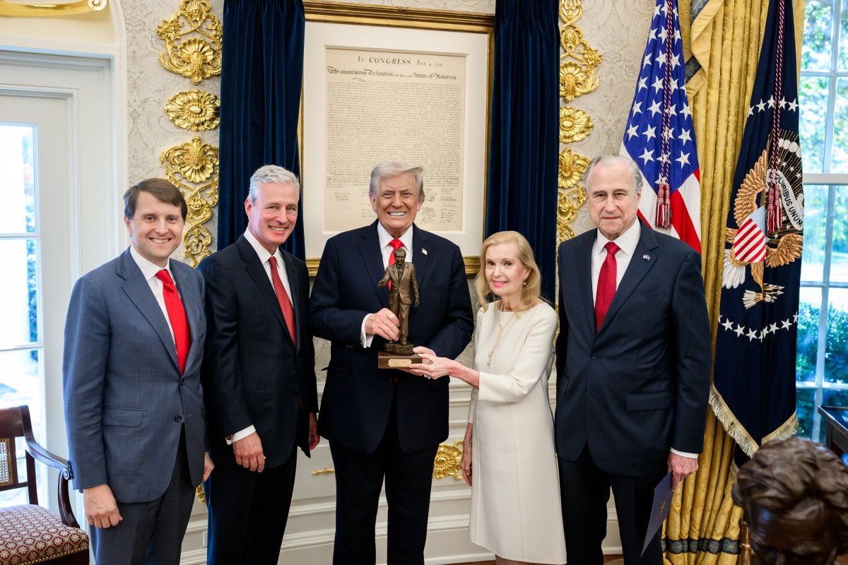President Donald Trump is presented with the Richard Nixon Architect of Peace Award, Tuesday, October 21, 2025, during a ceremony in the Oval Office. In attendance are Richard Nixon’s daughter, Tricia Nixon Cox, her husband Edward Cox,  ex-national security adviser Robert O’Brien, and acting archivist of the U.S. Jim Byron. (Official White House Photo by Daniel Torok)