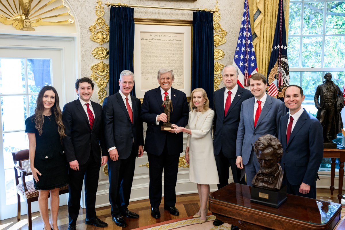 President Donald Trump is presented with the Richard Nixon Architect of Peace Award, Tuesday, October 21, 2025, during a ceremony in the Oval Office. In attendance are Richard Nixon’s daughter, Tricia Nixon Cox, her husband Edward Cox,  ex-national security adviser Robert O’Brien, and acting archivist of the U.S. Jim Byron. (Official White House Photo by Daniel Torok)