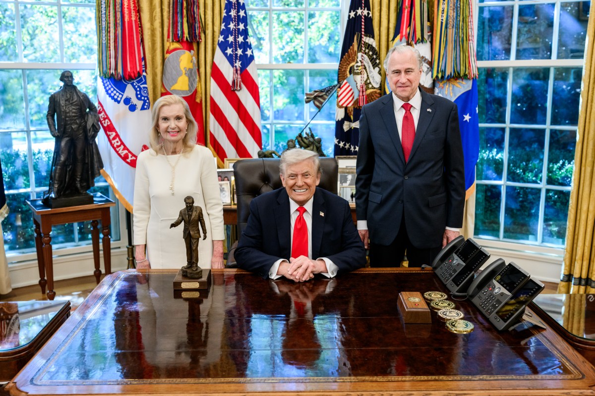 President Donald Trump is presented with the Richard Nixon Architect of Peace Award, Tuesday, October 21, 2025, during a ceremony in the Oval Office. In attendance are Richard Nixon’s daughter, Tricia Nixon Cox, her husband Edward Cox,  ex-national security adviser Robert O’Brien, and acting archivist of the U.S. Jim Byron. (Official White House Photo by Daniel Torok)