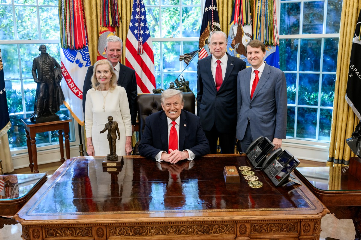 President Donald Trump is presented with the Richard Nixon Architect of Peace Award, Tuesday, October 21, 2025, during a ceremony in the Oval Office. In attendance are Richard Nixon’s daughter, Tricia Nixon Cox, her husband Edward Cox,  ex-national security adviser Robert O’Brien, and acting archivist of the U.S. Jim Byron. (Official White House Photo by Daniel Torok)
