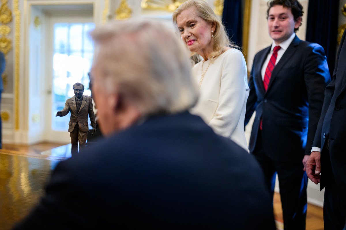 President Donald Trump is presented with the Richard Nixon Architect of Peace Award, Tuesday, October 21, 2025, during a ceremony in the Oval Office. In attendance are Richard Nixon’s daughter, Tricia Nixon Cox, her husband Edward Cox,  ex-national security adviser Robert O’Brien, and acting archivist of the U.S. Jim Byron. (Official White House Photo by Daniel Torok)