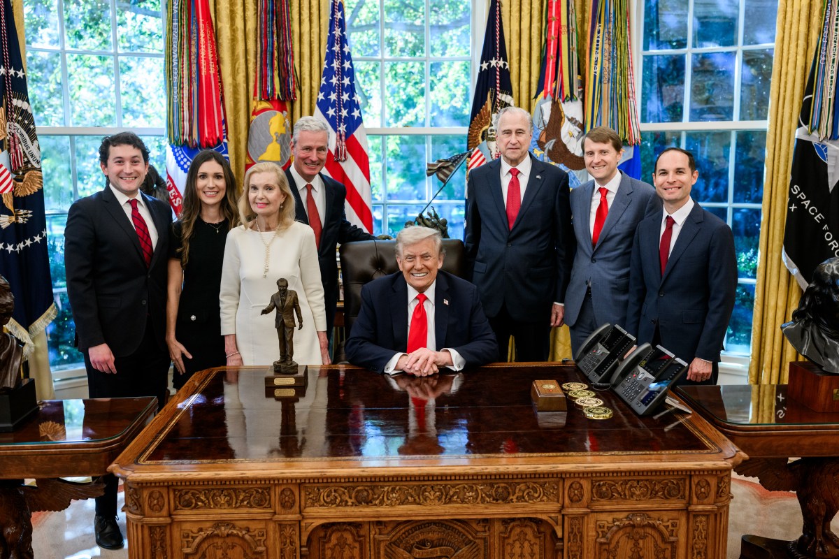 President Donald Trump is presented with the Richard Nixon Architect of Peace Award, Tuesday, October 21, 2025, during a ceremony in the Oval Office. In attendance are Richard Nixon’s daughter, Tricia Nixon Cox, her husband Edward Cox,  ex-national security adviser Robert O’Brien, and acting archivist of the U.S. Jim Byron. (Official White House Photo by Daniel Torok)
