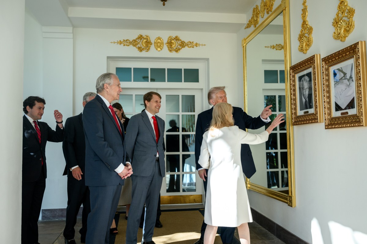 President Donald Trump walks on the West Colonnade with Tricia Nixon Cox and her husband Edward Cox, after being presented with the Richard Nixon Architect of Peace Award, Tuesday, October 21, 2025, during a ceremony in the Oval Office. (Official White House Photo by Daniel Torok)