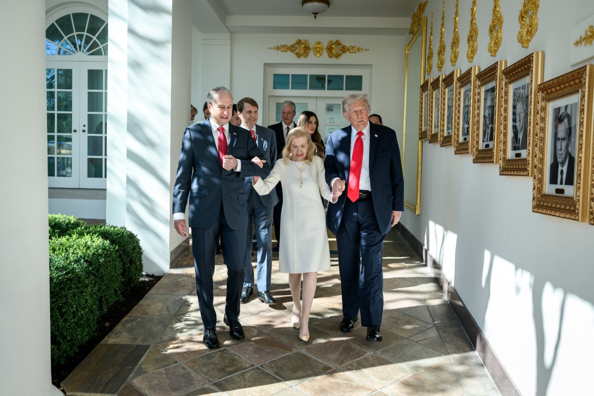 President Donald Trump walks on the West Colonnade with Tricia Nixon Cox and her husband Edward Cox, after being presented with the Richard Nixon Architect of Peace Award, Tuesday, October 21, 2025, during a ceremony in the Oval Office. (Official White House Photo by Daniel Torok)
