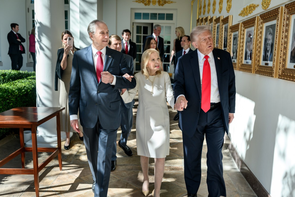 President Donald Trump walks on the West Colonnade with Tricia Nixon Cox and her husband Edward Cox, after being presented with the Richard Nixon Architect of Peace Award, Tuesday, October 21, 2025, during a ceremony in the Oval Office. (Official White House Photo by Daniel Torok)