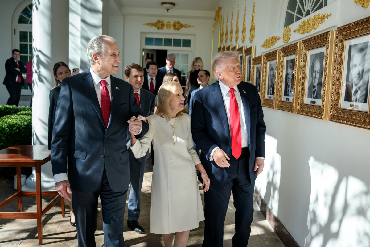 President Donald Trump walks on the West Colonnade with Tricia Nixon Cox and her husband Edward Cox, after being presented with the Richard Nixon Architect of Peace Award, Tuesday, October 21, 2025, during a ceremony in the Oval Office. (Official White House Photo by Daniel Torok)