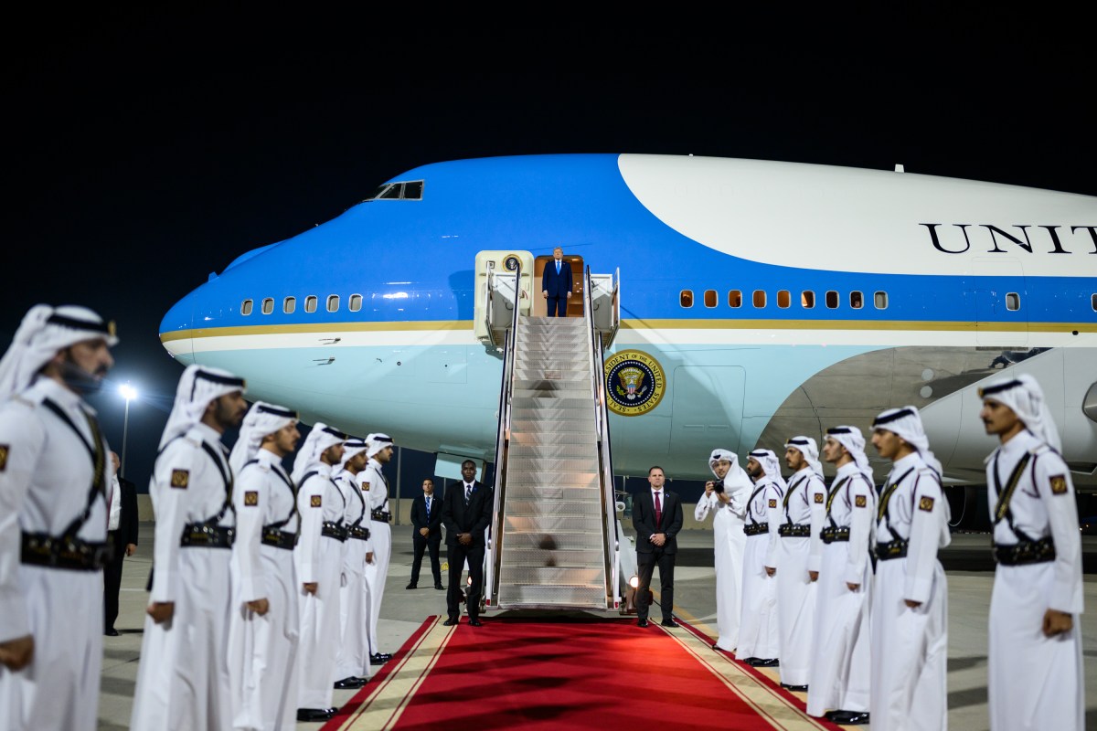 President Donald Trump awaits the arrival of Qatar’s Emir Sheikh Tamim bin Hamad Al-Thani and Prime Minister and Foreign Minister Sheikh Mohammed bin Abdulrahman bin Jassim Al-Thani for a meeting aboard Air Force One during a refueling stop in Doha, Qatar, October 25, 2025. (Official White House Photo by Daniel Torok)