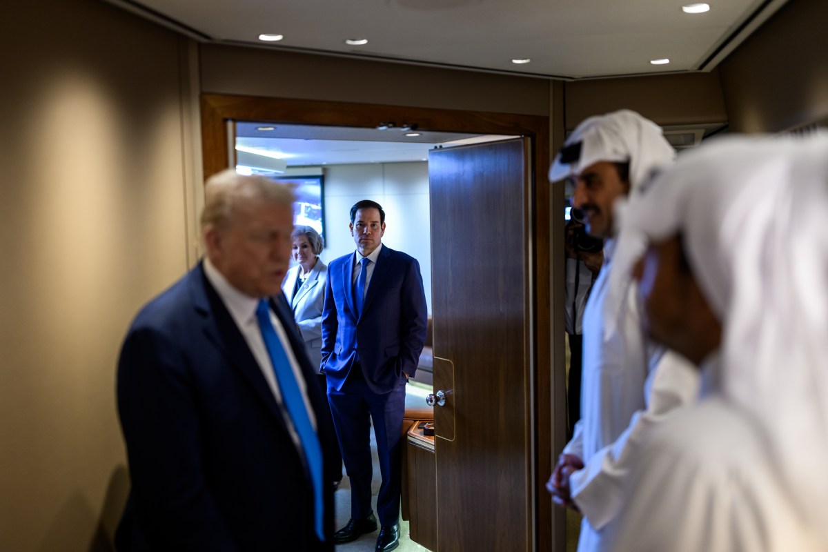 Secretary of State Marco Rubio looks on as President Donald Trump meets with Qatar’s Emir Sheikh Tamim bin Hamad Al-Thani and Prime Minister and Foreign Minister Sheikh Mohammed bin Abdulrahman bin Jassim Al-Thani aboard Air Force One during a refueling stop in Doha, Qatar, enroute to the ASEAN summit in Malaysia, October 25, 2025. (Official White House Photo by Daniel Torok)