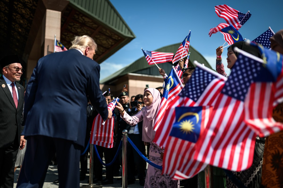 President Donald Trump participates in an arrival ceremony with Malaysian Prime Minister Anwar Ibrahim at Kuala Lumpur International Airport Sunday, October 25, 2025, in Kuala Lumpur, Malaysia. (Official White House Photo by Daniel Torok)