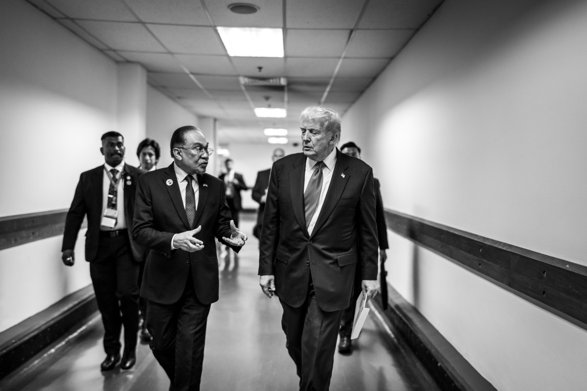 President Donald Trump speaks with Malaysian Prime Minister Seri Anwar Ibrahim after signing the Kuala Lumpur Accord, Sunday, October 25, 2025, at the ASEAN Summit in Kuala Lumpur, Malaysia. (Official White House Photo by Daniel Torok)