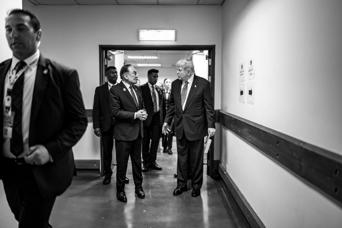 President Donald Trump speaks with Malaysian Prime Minister Seri Anwar Ibrahim after signing the Kuala Lumpur Accord, Sunday, October 25, 2025, at the ASEAN Summit in Kuala Lumpur, Malaysia. (Official White House Photo by Daniel Torok)