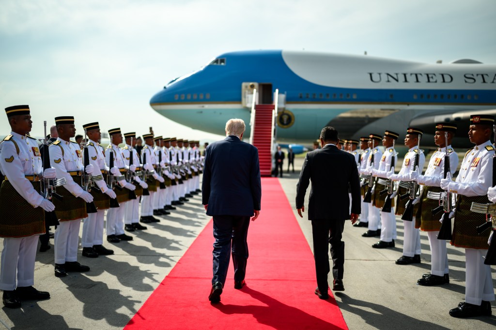 President Donald Trump walks towards Air Force One as he bids farewell to Malaysian officials at Kuala Lumpur International Airport, October 27, 2025 in Kuala Lumpur, Malaysia. (Official White House Photo by Daniel Torok)
