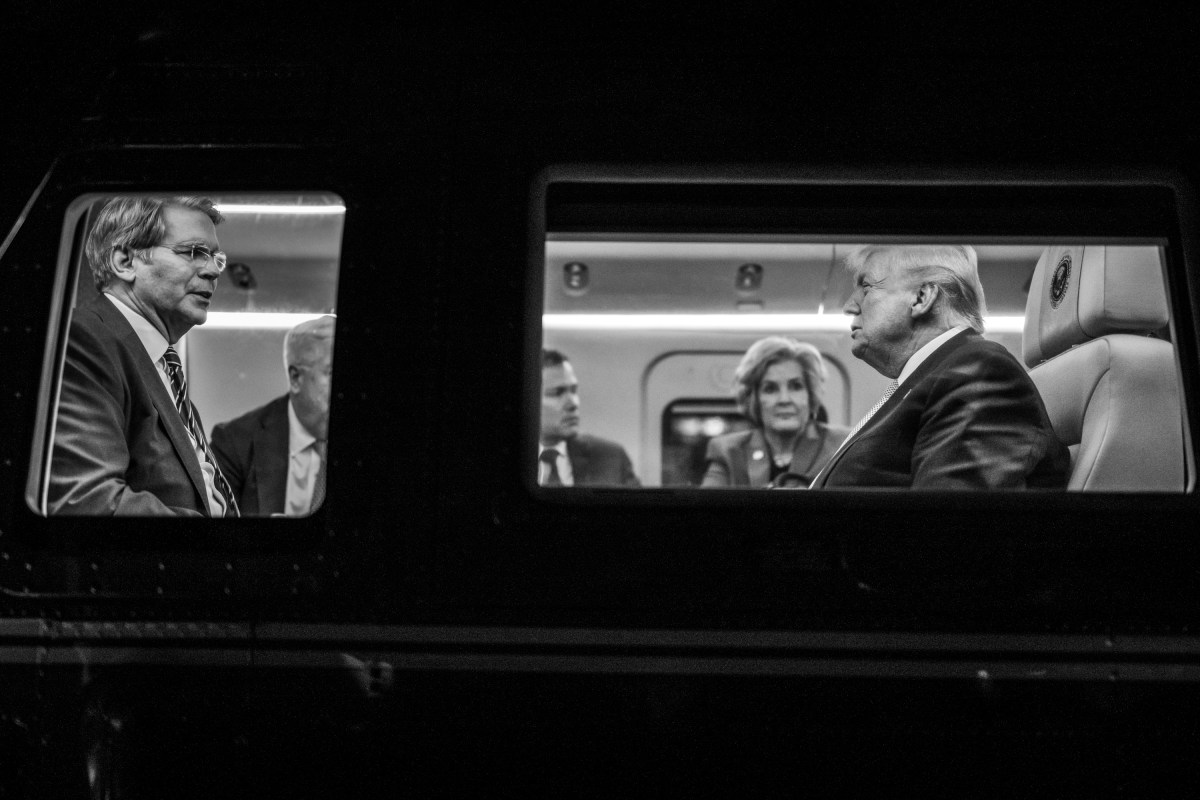 President Donald Trump speaks with Secretary of Treasury Scott Bessent, Secretary of State Marco Rubio, and Chief of Staff Susie Wiles on board Marine One at Hardy Barracks in Tokyo, Japan, Monday, October 27, 2025. (Official White House Photo by Daniel Torok)