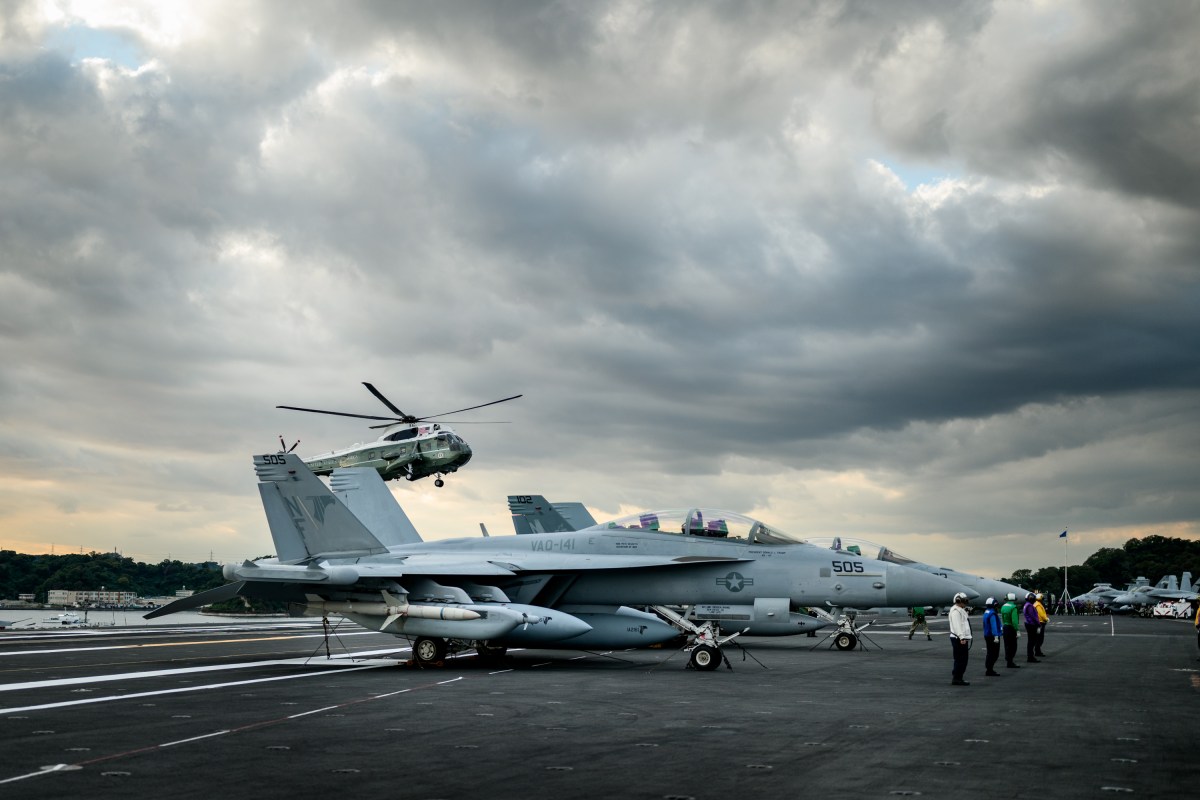 President Donald Trump disembarks Marine One alongside Japanese Prime Minister Sanae Takaichi aboard the USS George Washington at Yokosuka Naval Base, Japan on Tuesday, October 28, 2025. (Official White House Photo by Daniel Torok)