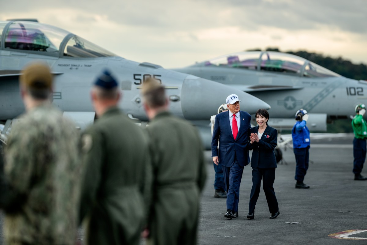 President Donald Trump greets military leadership alongside Japanese Prime Minister Sanae Takaichi aboard the USS George Washington at Yokosuka Naval Base, Japan on Tuesday, October 28, 2025.  (Official White House Photo by Daniel Torok)