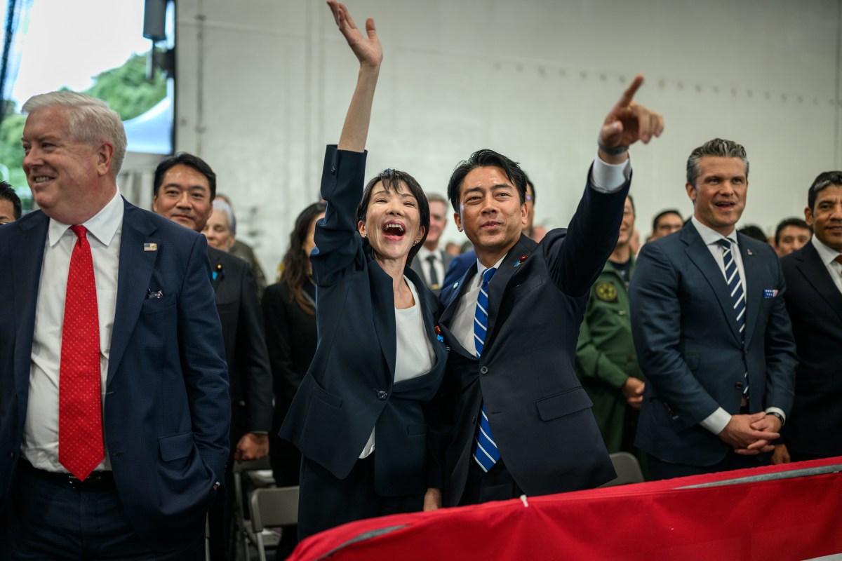 Japanese Prime Minister Sanae Takaichi waves to U.S. Navy sailors aboard the USS George Washington at Yokosuka Naval Base, Japan on Tuesday, October 28, 2025. (Official White House Photo by Daniel Torok)