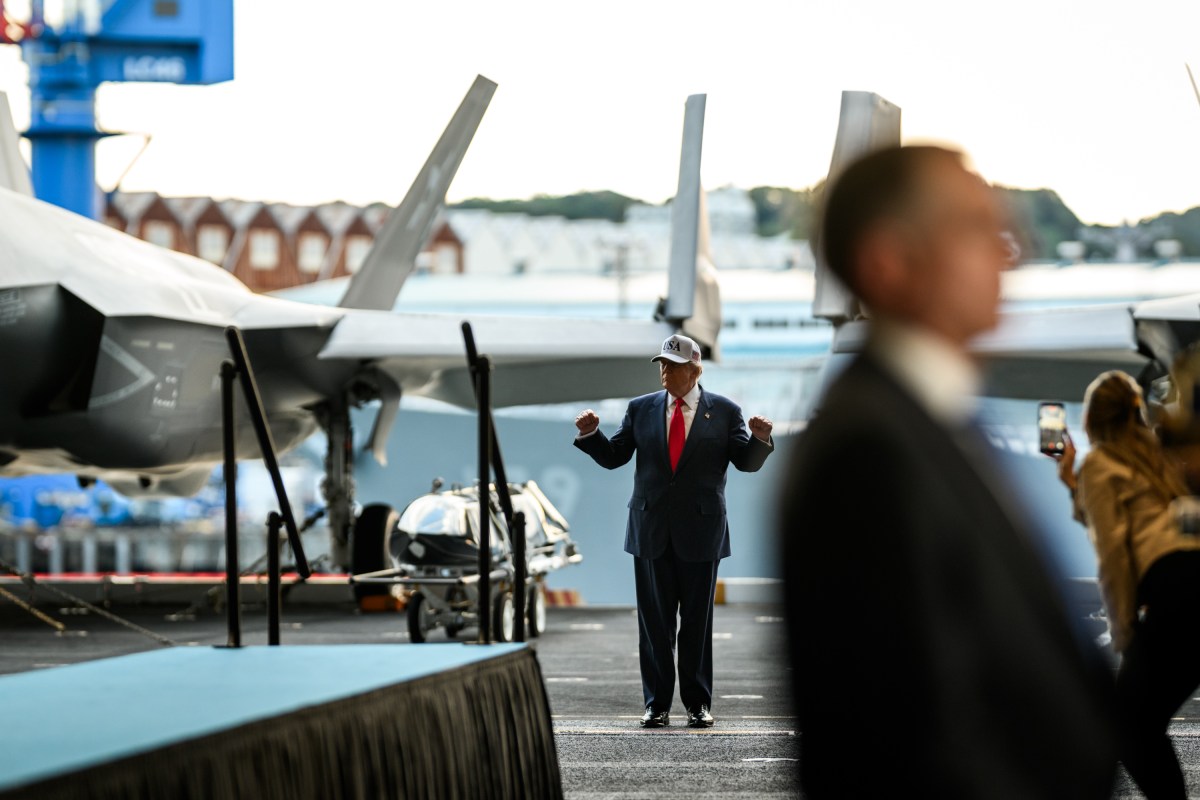 President Donald Trump arrives to deliver remarks to Yokosuka Naval troops aboard the USS George Washington at Yokosuka Naval Base, Japan on Tuesday, October 28, 2025.  (Official White House Photo by Daniel Torok)