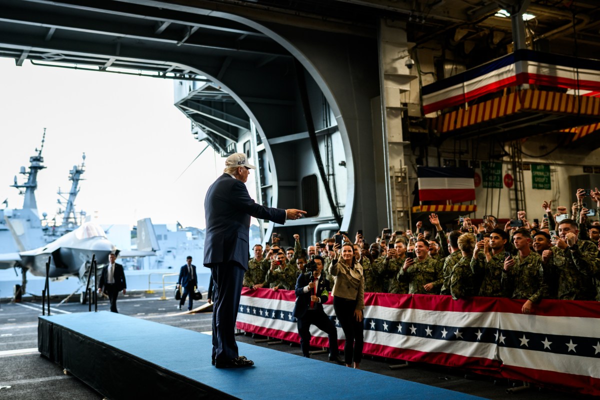 President Donald Trump arrives to deliver remarks to Yokosuka Naval troops aboard the USS George Washington at Yokosuka Naval Base, Japan on Tuesday, October 28, 2025.  (Official White House Photo by Daniel Torok)