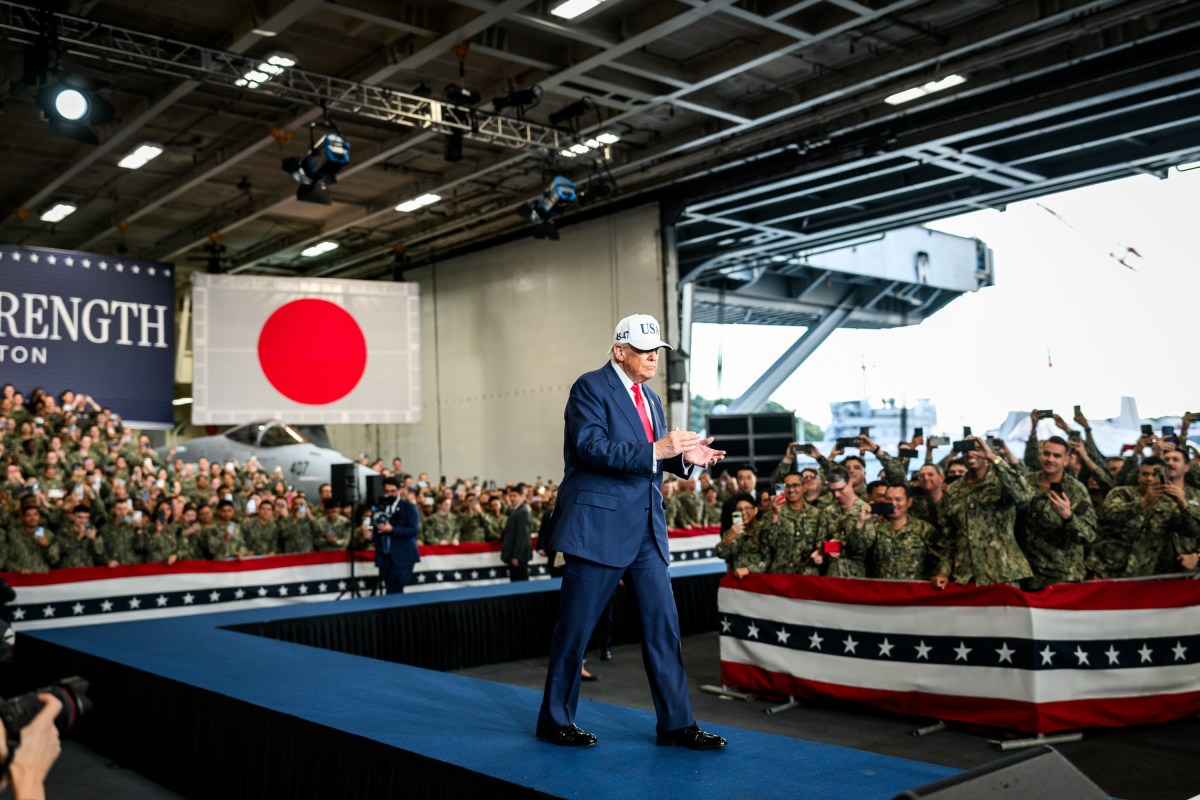 President Donald Trump arrives to deliver remarks to Yokosuka Naval troops aboard the USS George Washington at Yokosuka Naval Base, Japan on Tuesday, October 28, 2025.  (Official White House Photo by Daniel Torok)