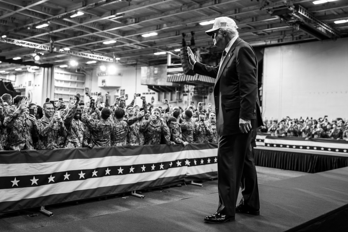 President Donald Trump leaves the stage after delivering remarks to Yokosuka Naval troops aboard the USS George Washington at Yokosuka Naval Base, Japan on Tuesday, October 28, 2025.  (Official White House Photo by Daniel Torok)