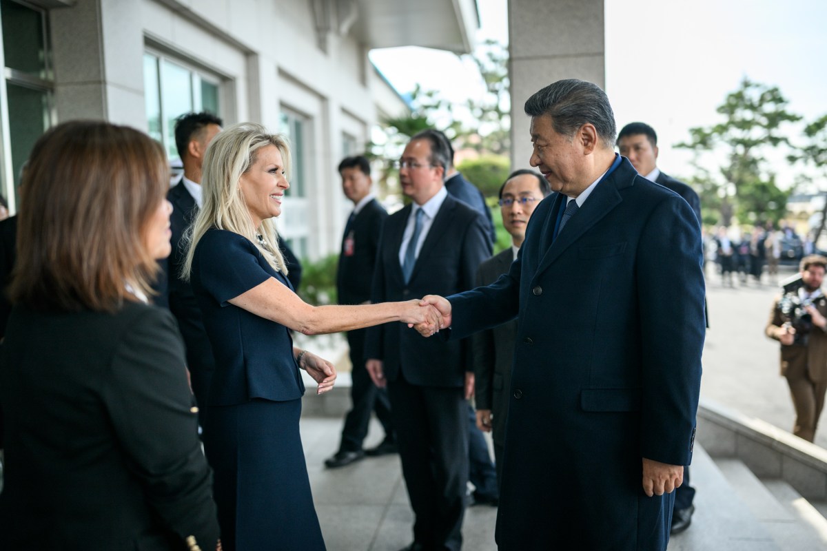 Chinese President Xi Jinping is greeted y Chief of Protocol Monica Crowley for a bilateral meeting with President Donald Trump at the Gimhae International Airport terminal, Thursday, October 30, 2025, in Busan, South Korea. (Official White House Photo by Daniel Torok)