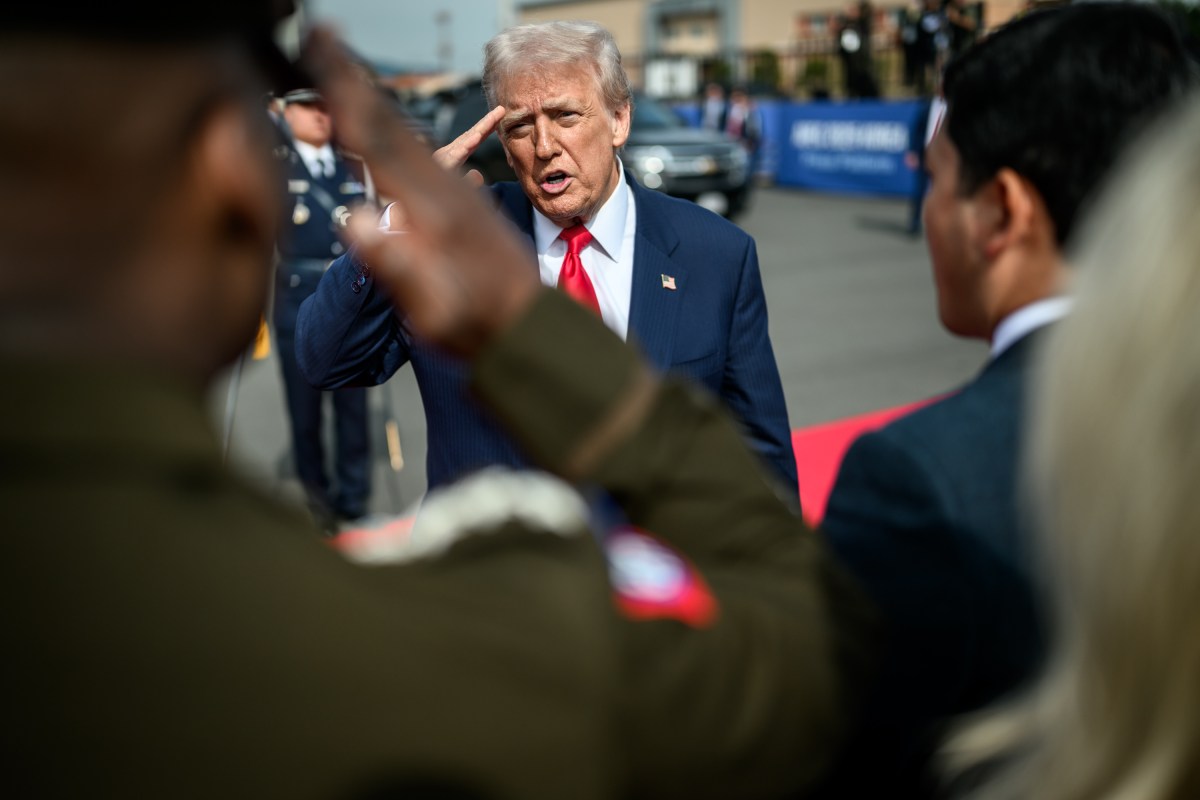 President Donald Trump greets officials before boarding Air Force One at Gimhae International Airport in Busan, South Korea on Thursday, October 30, 2025. (Official White House Photo by Daniel Torok)