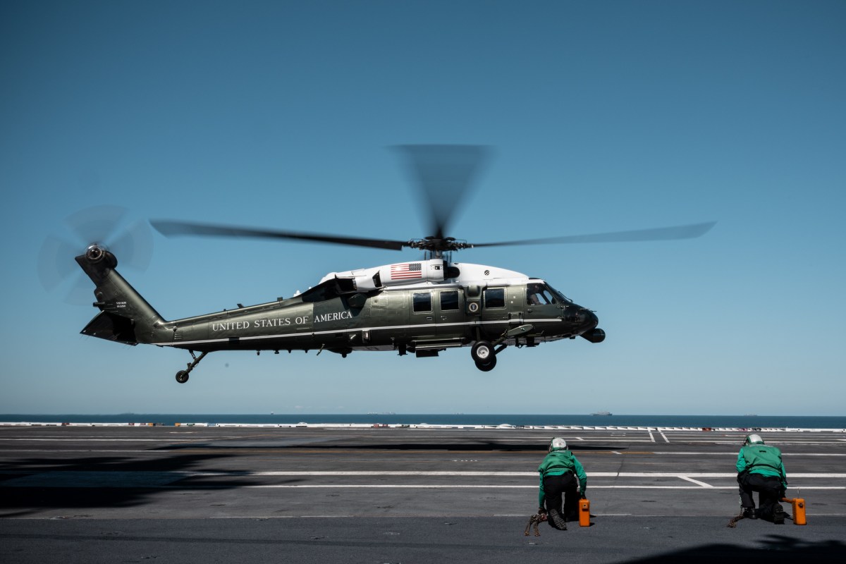 President Donald Trump and First Lady Melania Trump arrive on Marine One aboard the aircraft carrier USS George H.W. Bush, Sunday, October 5, 2025, in Norfolk, Virginia. (Official White House Photo by Andrea Hanks)