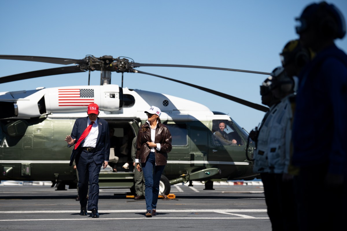 President Donald Trump and First Lady Melania Trump arrive on Marine One aboard the aircraft carrier USS George H.W. Bush, Sunday, October 5, 2025, in Norfolk, Virginia. (Official White House Photo by Andrea Hanks)