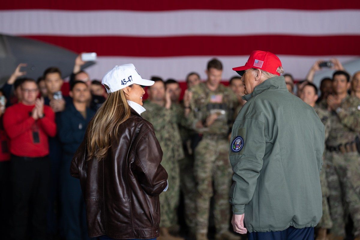 US President Donald Trump and First Lady Melania Trump greets sailors during a visit to the USS George H.W. Bush aircraft carrier which is out at sea near Norfolk, Virginia, October 5, 2025, as they travel to see a Naval demonstration as part of the US Navy's 250th anniversary celebration, "America's Navy 250: Titans of the Sea - A Salute to the Fleet". (Official White House Photo by Andrea Hanks)
