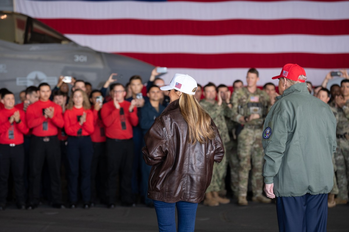 US President Donald Trump and First Lady Melania Trump greets sailors during a visit to the USS George H.W. Bush aircraft carrier which is out at sea near Norfolk, Virginia, October 5, 2025, as they travel to see a Naval demonstration as part of the US Navy's 250th anniversary celebration, "America's Navy 250: Titans of the Sea - A Salute to the Fleet". (Official White House Photo by Andrea Hanks)