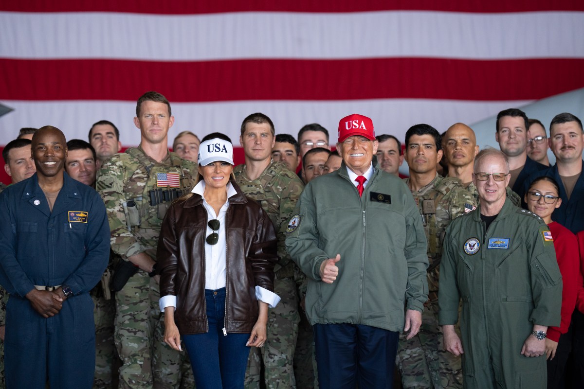President Donald Trump and First Lady Melania Trump pose for photos with U.S. Navy sailors stationed aboard the aircraft carrier USS George H.W. Bush, Sunday, October 5, 2025, in Norfolk, Virginia. (Official White House Photo by Andrea Hanks)