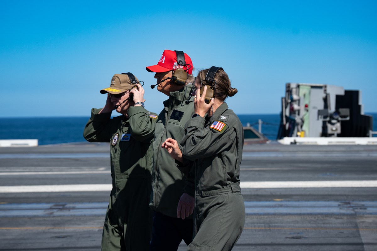 President Donald Trump and First Lady Melania Trump observe naval sea power demonstrations in honor of the 250th anniversary of the U.S. Navy, Sunday, October 5, 2025, aboard the USS George H.W. Bush in the Atlantic Ocean off the coast of Norfolk, Virginia. (Official White House Photo by Andrea Hanks)