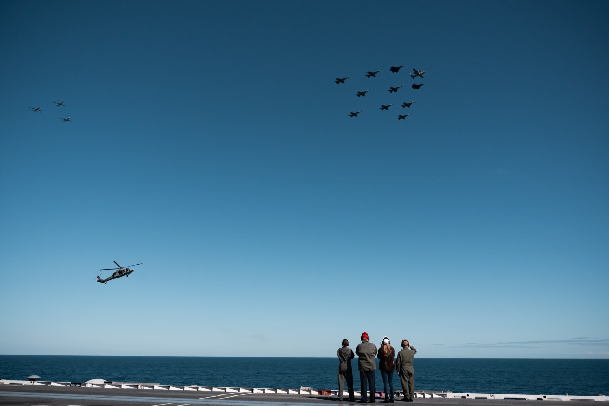 President Donald Trump and First Lady Melania Trump observe naval sea power demonstrations in honor of the 250th anniversary of the U.S. Navy, Sunday, October 5, 2025, aboard the USS George H.W. Bush in the Atlantic Ocean off the coast of Norfolk, Virginia. (Official White House Photo by Andrea Hanks)