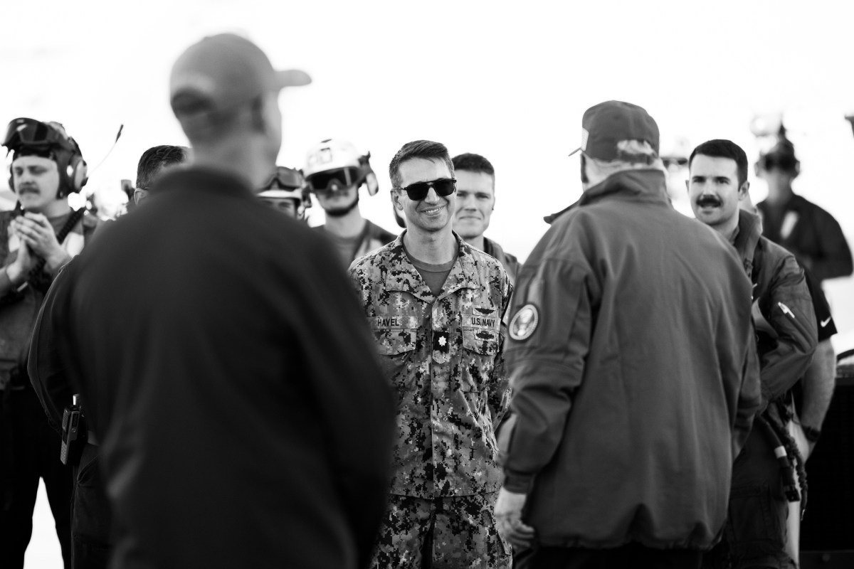 President Donald Trump and First Lady Melania Trump speak with sailors after stationed aboard the USS George H.W. Bush after naval sea power demonstrations in honor of the 250th anniversary of the U.S. Navy, Sunday, October 5, 2025, in the Atlantic Ocean off the coast of Norfolk, Virginia. (Official White House Photo by Andrea Hanks)