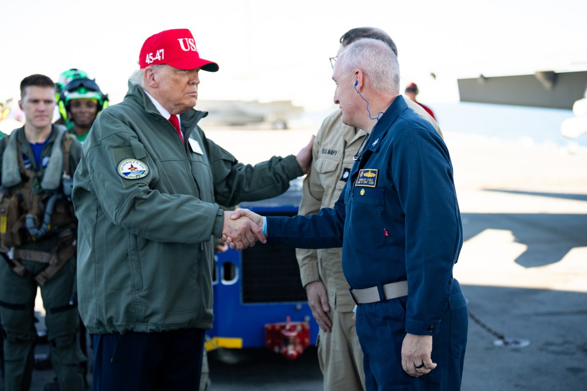 President Donald Trump and First Lady Melania Trump speak with sailors after stationed aboard the USS George H.W. Bush after naval sea power demonstrations in honor of the 250th anniversary of the U.S. Navy, Sunday, October 5, 2025, in the Atlantic Ocean off the coast of Norfolk, Virginia. (Official White House Photo by Andrea Hanks)