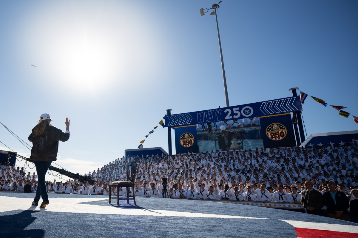 US First Lady Melania Trump waves during the US Navy's 250th anniversary celebration, "America's Navy 250: Titans of the Sea - A Salute to the Fleet", at Naval Station Norfolk Pier 14 in Norfolk, Virginia on October 5, 2025. (Official White House Photo by Andrea Hanks)