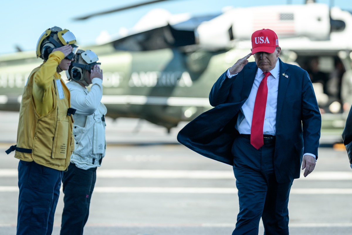 President Donald Trump and First Lady Melania Trump greet commanding officers aboard the aircraft carrier USS George H.W. Bush, Sunday, October 5, 2025, in Norfolk, Virginia. (Official White House Photo by Daniel Torok)