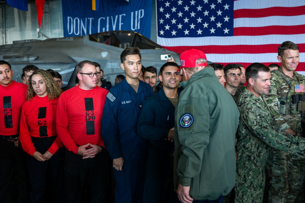 President Donald Trump and First Lady Melania Trump greet U.S. Navy sailors stationed aboard the aircraft carrier USS George H.W. Bush, Sunday, October 5, 2025, in Norfolk, Virginia. (Official White House Photo by Daniel Torok)
