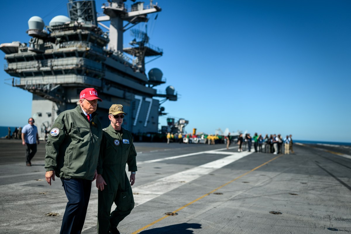 President Donald Trump and First Lady Melania Trump speak with Chief of Naval Operations Admiral Daryl Caudle and others during naval sea power demonstrations in honor of the 250th anniversary of the U.S. Navy, Sunday, October 5, 2025, aboard the USS George H.W. Bush in the Atlantic Ocean off the coast of Norfolk, Virginia. (Official White House Photo by Daniel Torok)