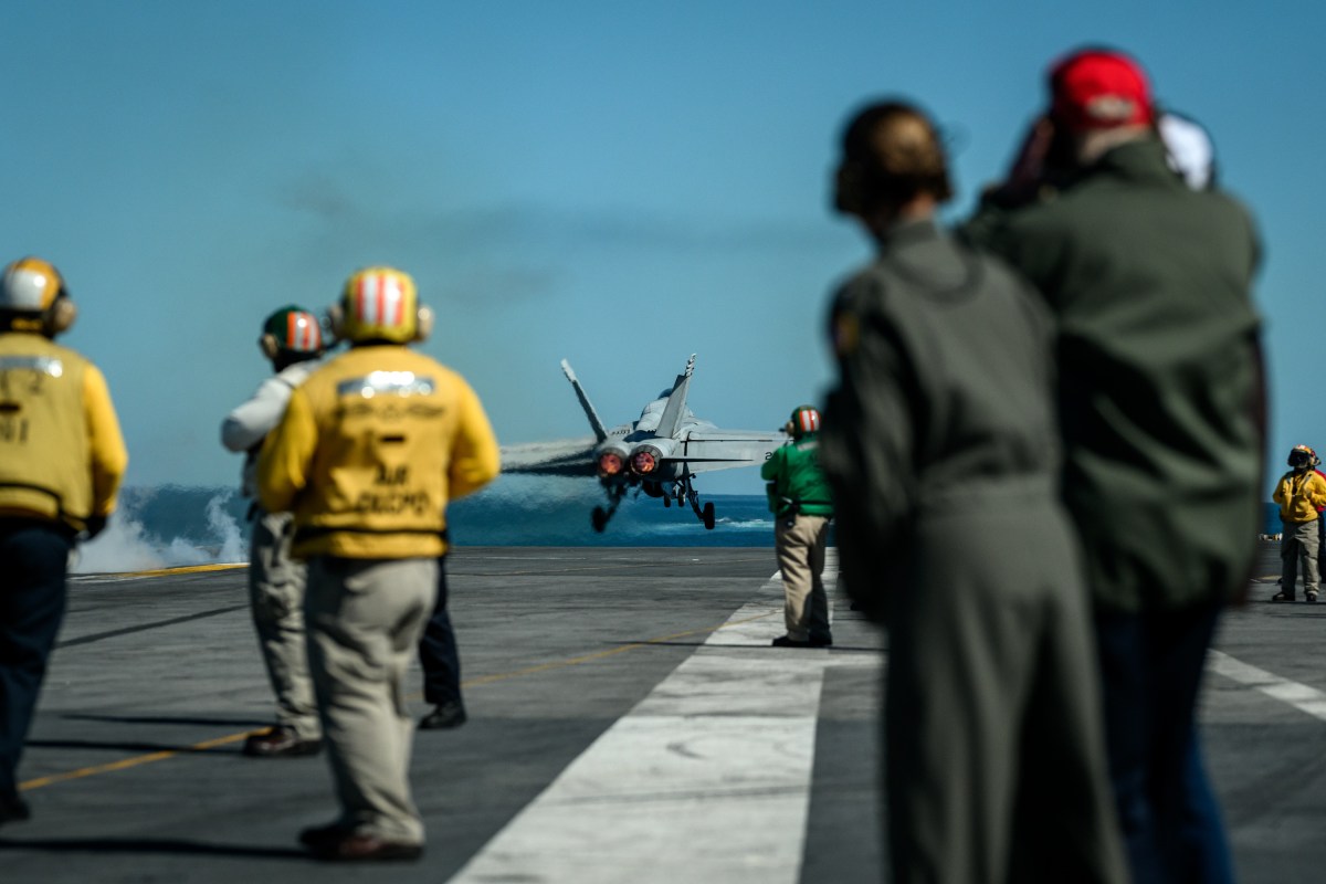 President Donald Trump and First Lady Melania Trump observe naval sea power demonstrations in honor of the 250th anniversary of the U.S. Navy, Sunday, October 5, 2025, aboard the USS George H.W. Bush in the Atlantic Ocean off the coast of Norfolk, Virginia. (Official White House Photo by Daniel Torok)